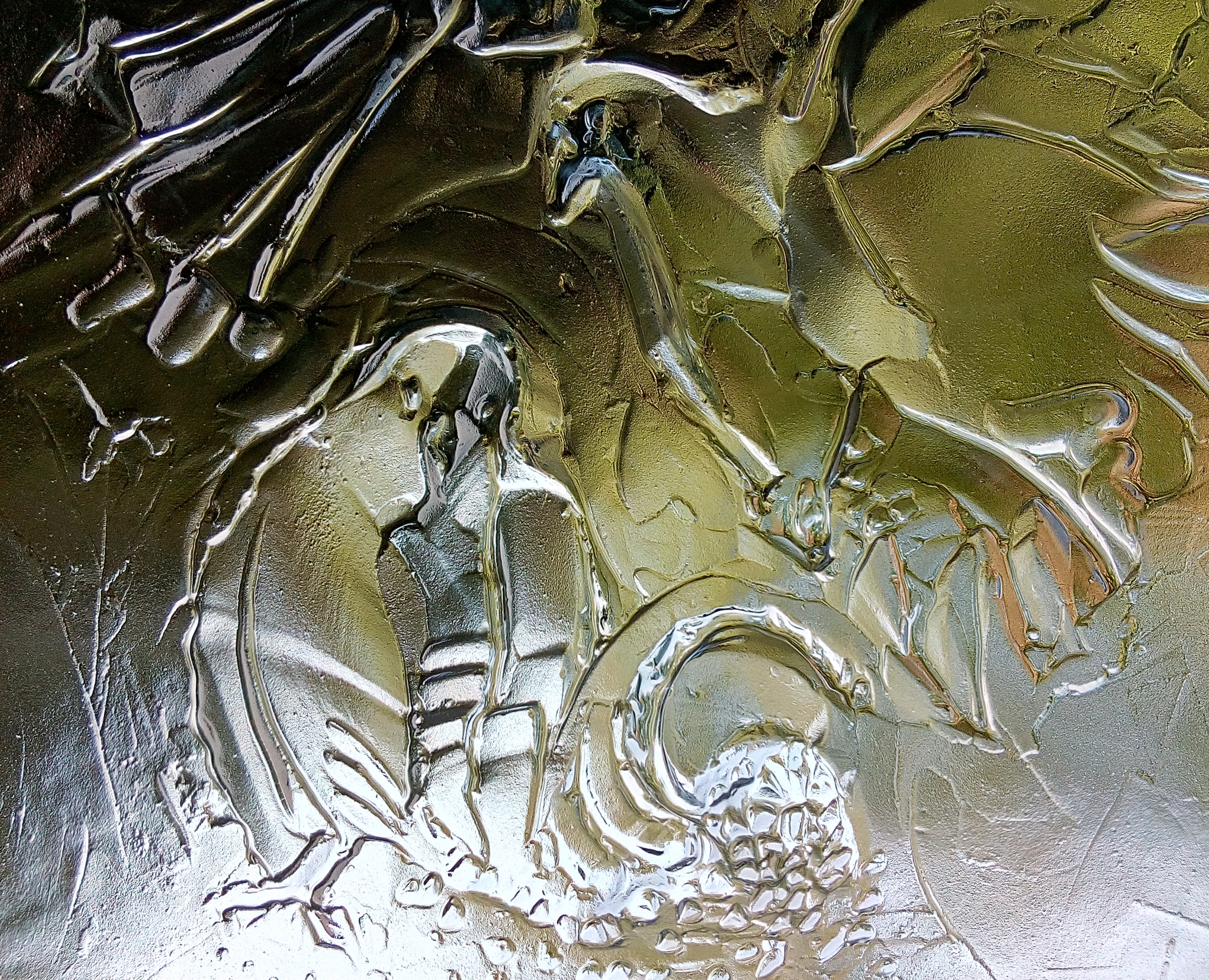 Relief glass formed from sheet glass